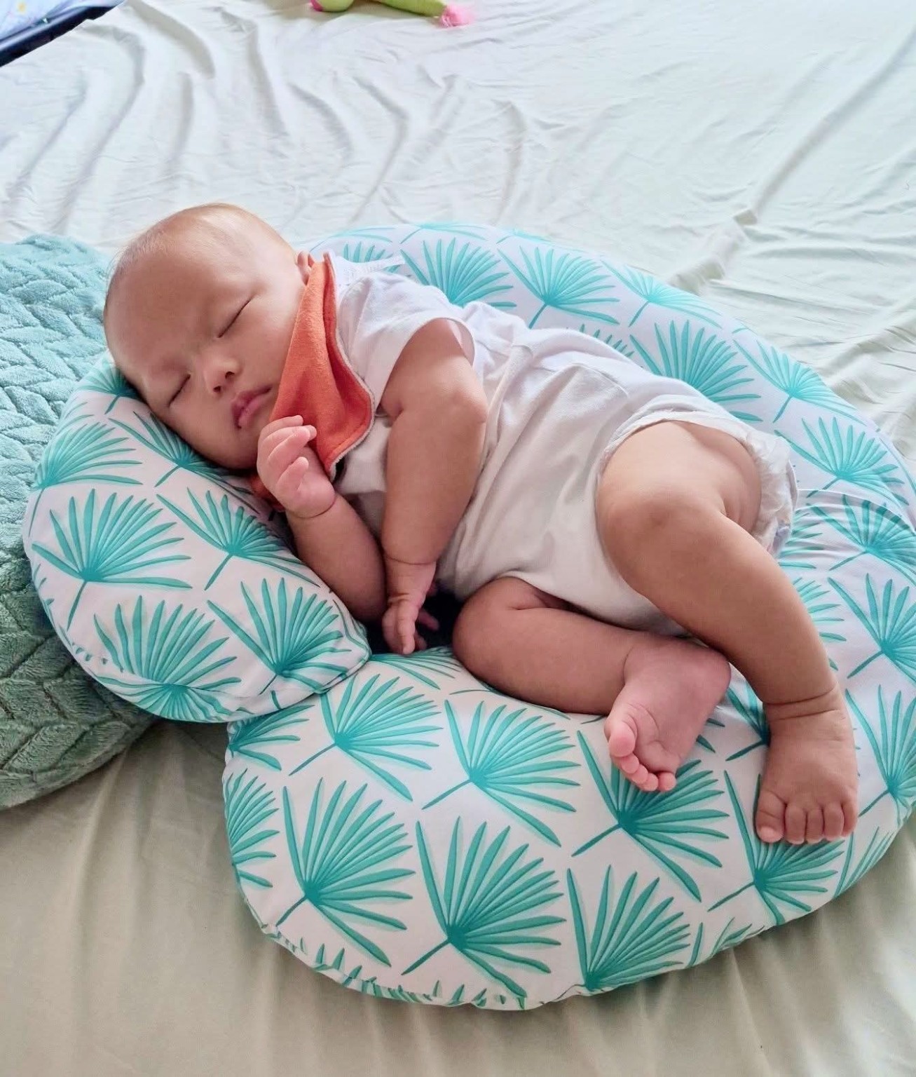 Newborn Koa sleeping peacefully after his birth