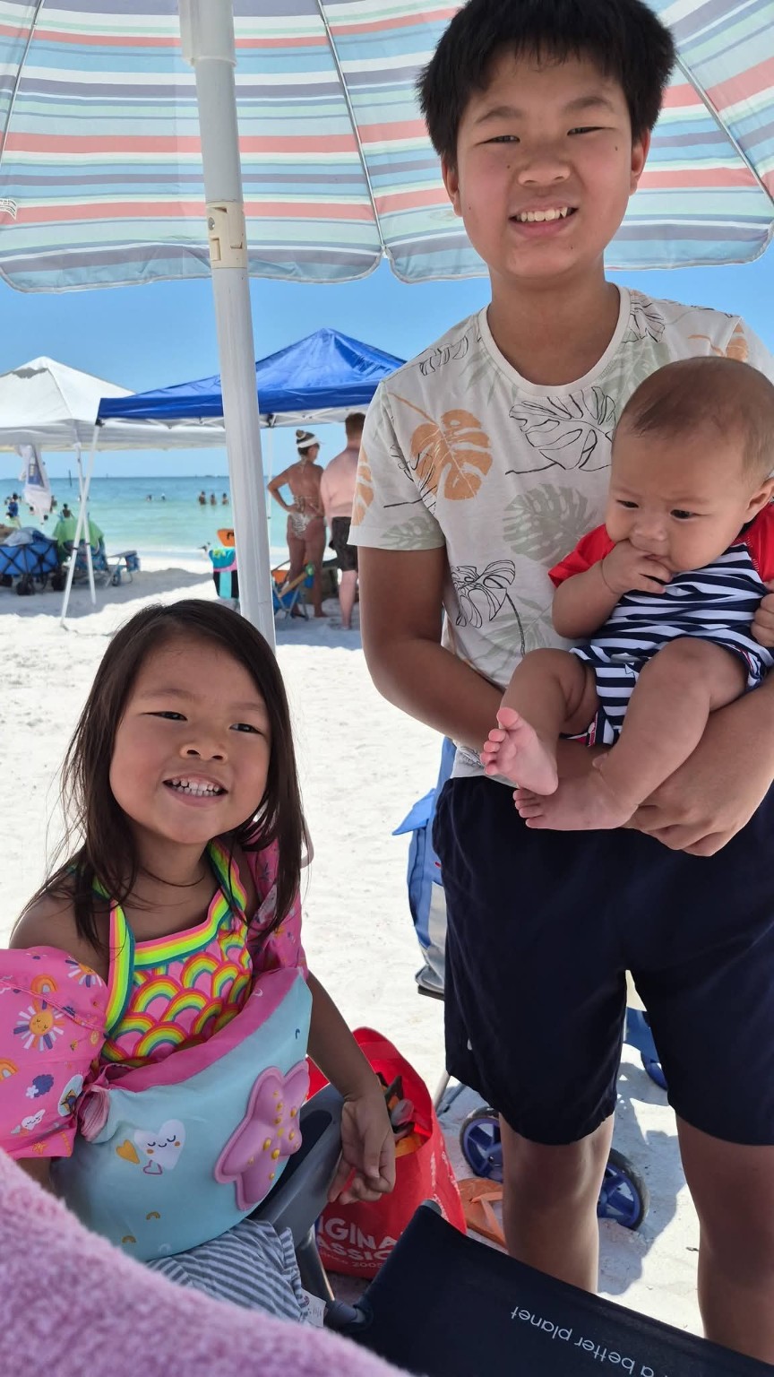 Koa with his older brother Atreo and sister Suryla at Clearwater Beach