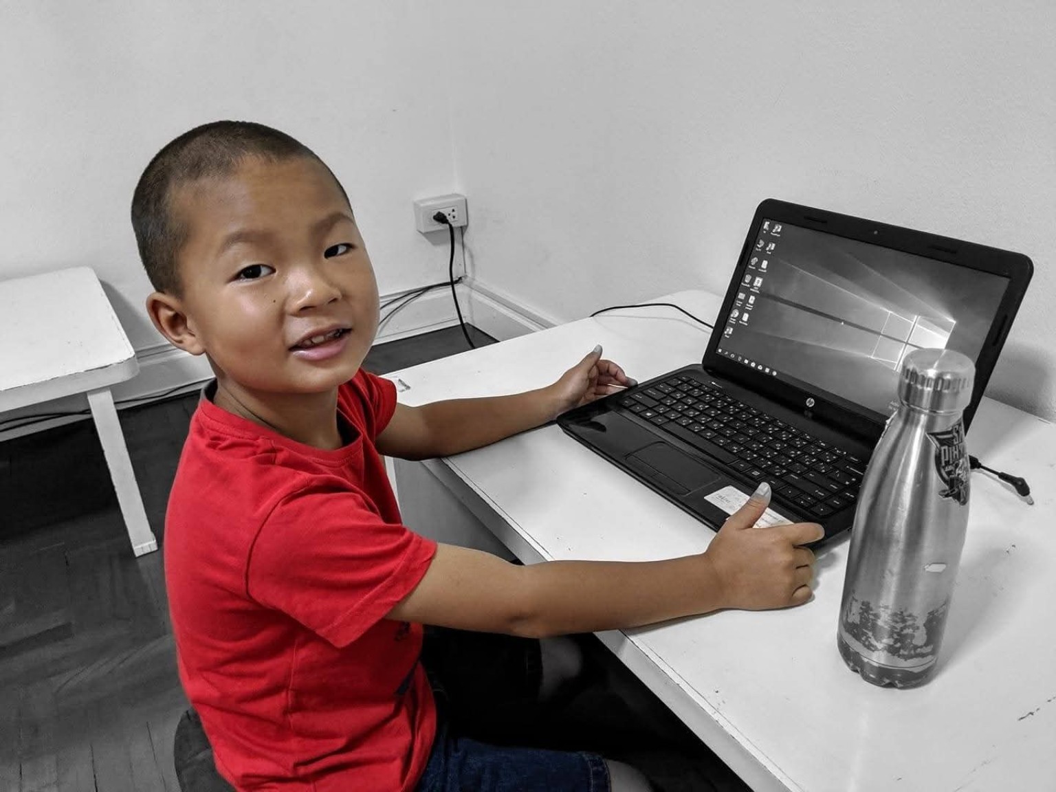 Atreo working on a technology project as part of worldschooling
